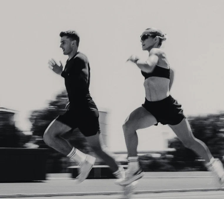 Two athletes running together